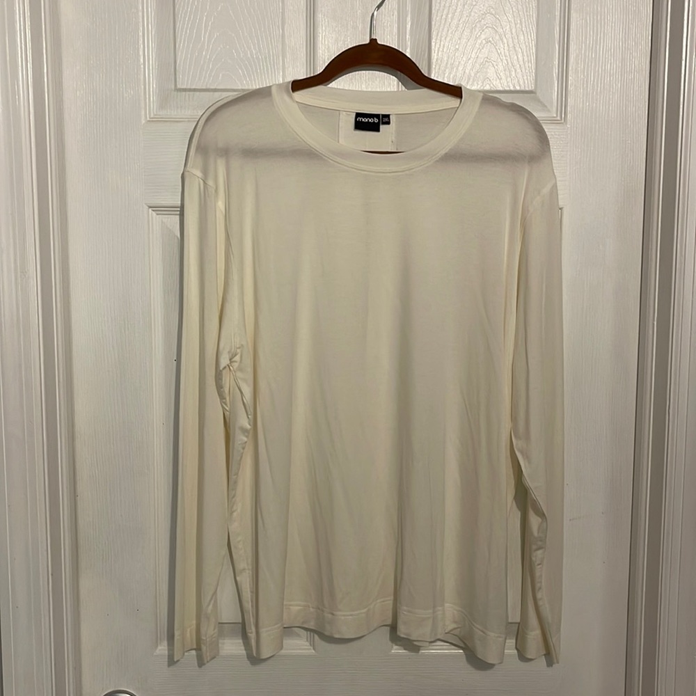 ⭐️buy 2 get 1 free⭐️ NWOT Mono B long sleeve cream shirt with keyhole back.